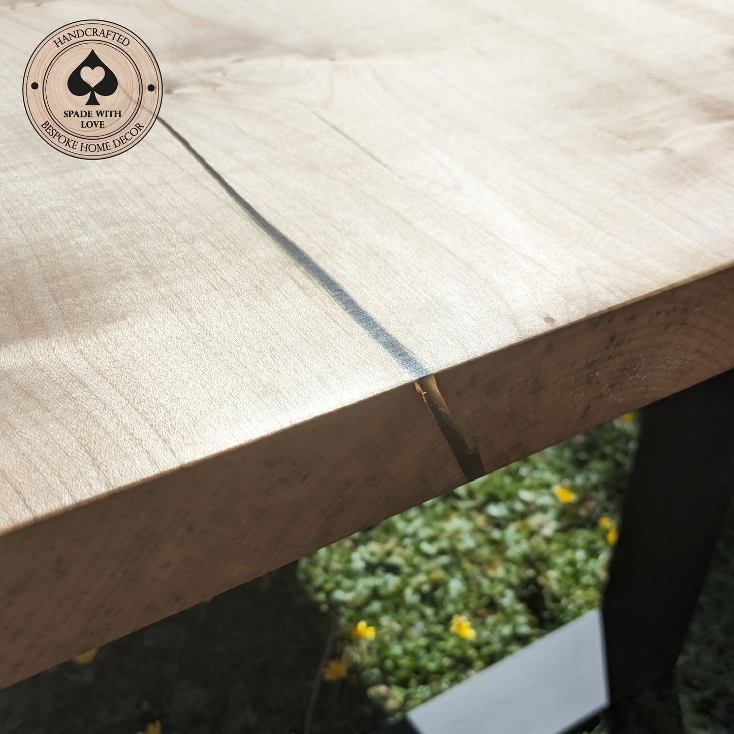 Solid Sycamore Coffee Table with Resin Infill Mounted on black metal legs